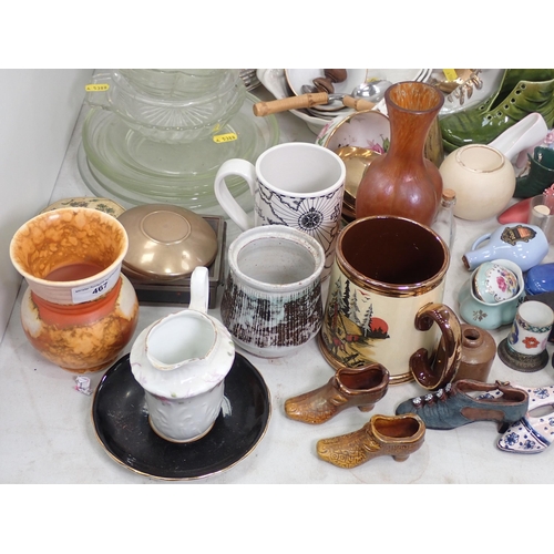 467 - A collection of ceramics including, a German Vase, a quantity of miniature ceramic Shoes and others,... 