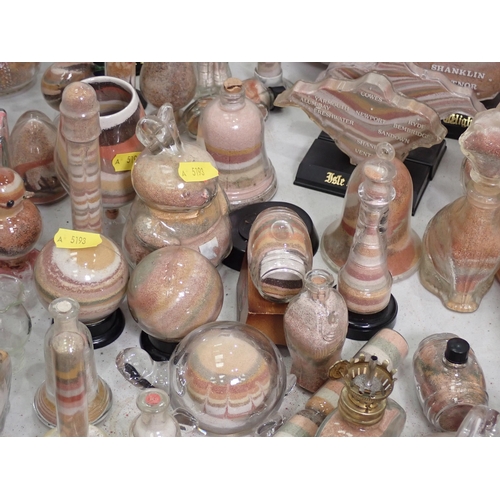 468 - A quantity of Sand filled glass Ornaments including, Animals, Bottles, etc.