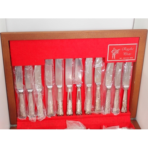 471 - A cased EPNS Cutlery Set and a Box of assorted Souvenir Spoons.