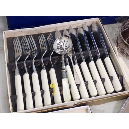 477 - A quantity of plated Stands, plated Salver, Coaster, Fish Knives and Forks etc