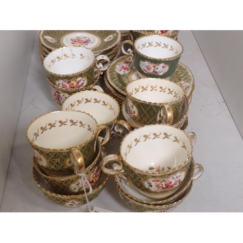 493 - A Swansea part Tea Set painted sprays with gilt decoration on a green ground, some A/F