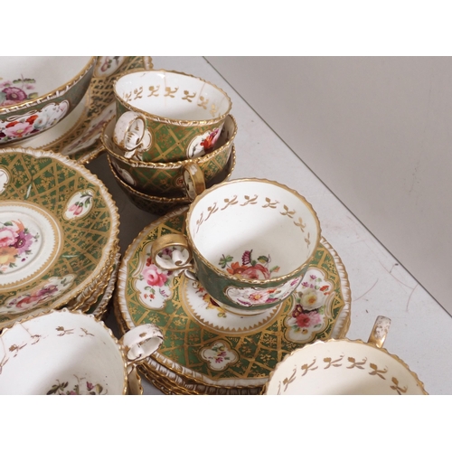 493 - A Swansea part Tea Set painted sprays with gilt decoration on a green ground, some A/F