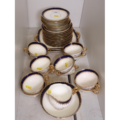 496 - A Coalport Part Tea Set with gilt and blue borders