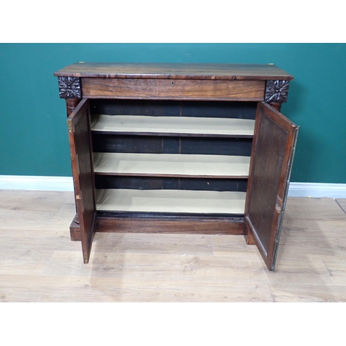 50 - A 19th Century rosewood Chiffonier fitted frieze drawer above pair of cupboard doors flanked by turn... 