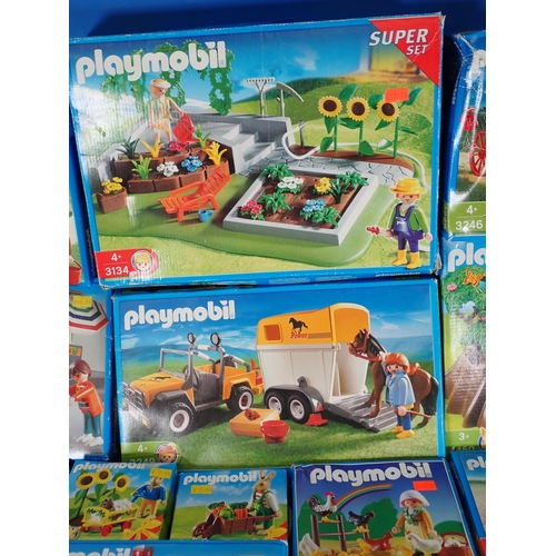 503 - A box of Playmobil Sets, farmyard, shops etc