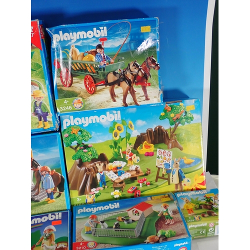 503 - A box of Playmobil Sets, farmyard, shops etc