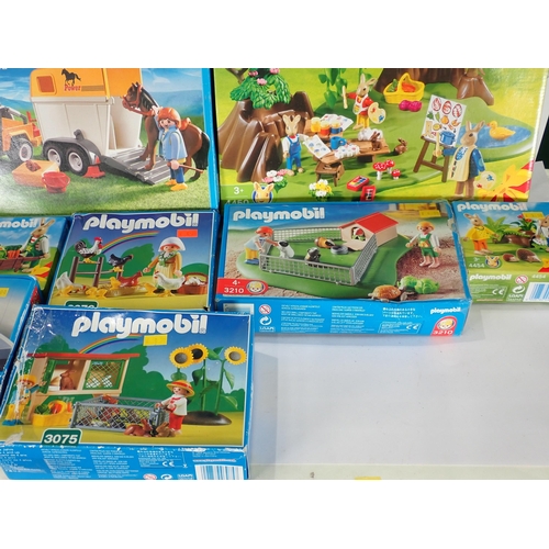 503 - A box of Playmobil Sets, farmyard, shops etc