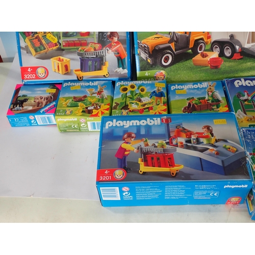 503 - A box of Playmobil Sets, farmyard, shops etc