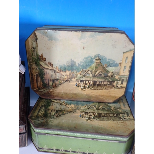 529 - Three Huntley and Palmer Tins in the form form of sandalwood Boxes and four other Tins