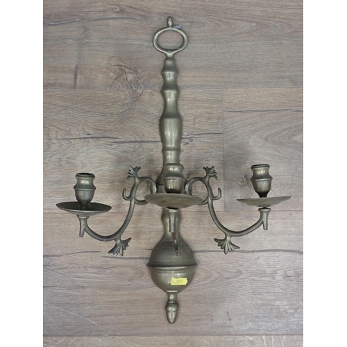 530 - A set of four brass three branch Wall Lights