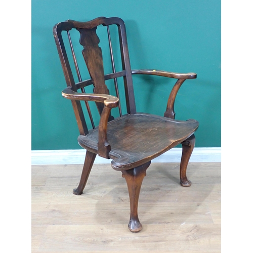 531 - A stained wood broad seated Elbow Chair with cabriole supports