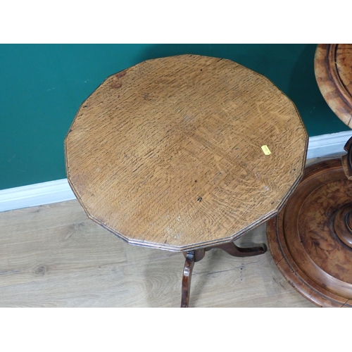 533 - An oak tripod Table with turned column and a two tier Stand with leafage design, 2ft 7in H