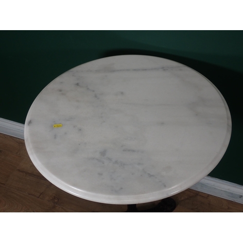 540 - A marble top circular Table with cast iron base