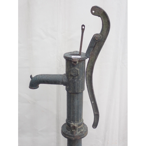 546 - A green painted metal Water Pump, 4ft 7in H