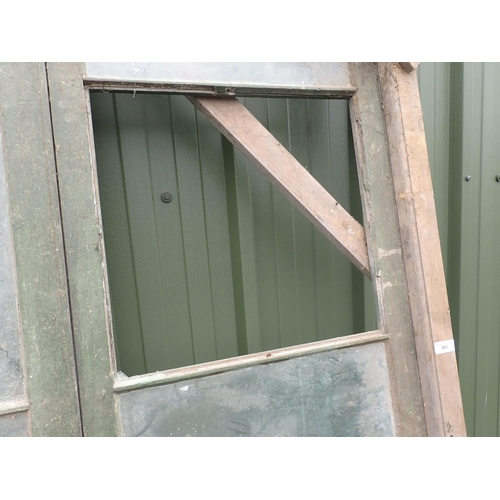 551 - A large pair of green painted glazed Doors, A/F, 7ft 5in H x 3ft 12in W (excluding frame)