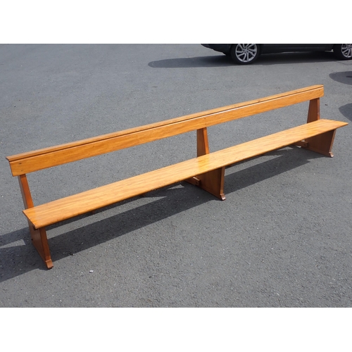 552 - A large hardwood Pew approx 12ft L (seat scratched in places)