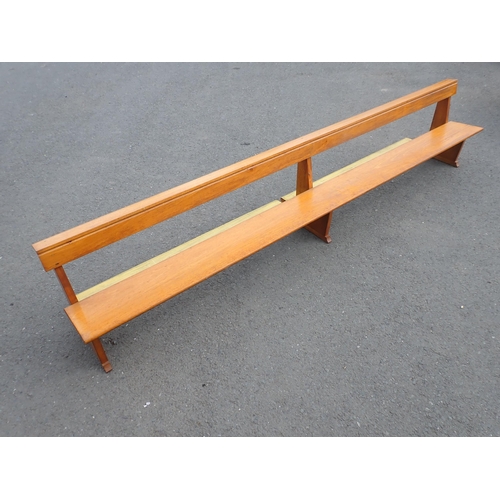 553 - A large hardwood Pew, approx 13ft 6in L (seat scratched in places)