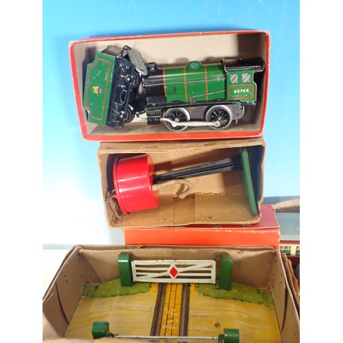 395 - A box of Hornby O Gauge including, a No. 51 Locomotive, a No. 1 Water Tank, Signal Arm, Level Crossi... 