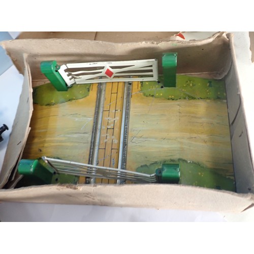 395 - A box of Hornby O Gauge including, a No. 51 Locomotive, a No. 1 Water Tank, Signal Arm, Level Crossi... 