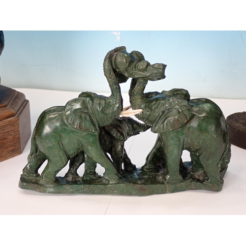 591 - A bronze Sculpture of fighting Bears signed H. Dixon, a carved figure group of elephants and a mare ... 