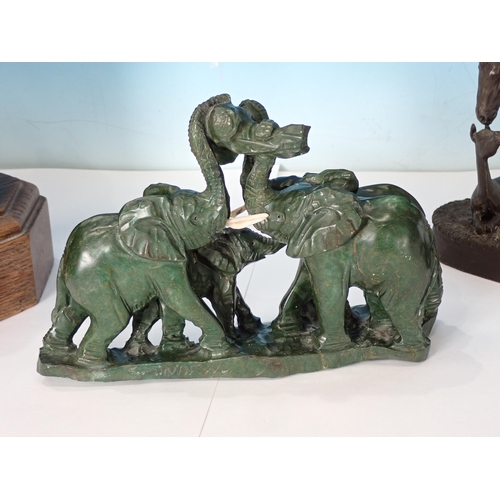 591 - A bronze Sculpture of fighting Bears signed H. Dixon, a carved figure group of elephants and a mare ... 