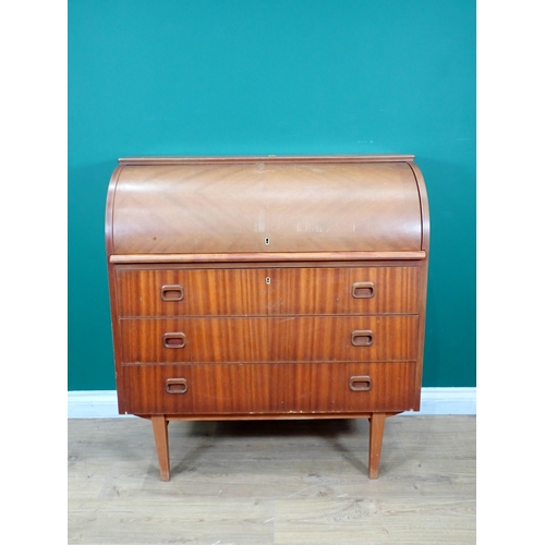 595 - A n oak linenfold panel two door Cupboard and a teak roll top Bureau