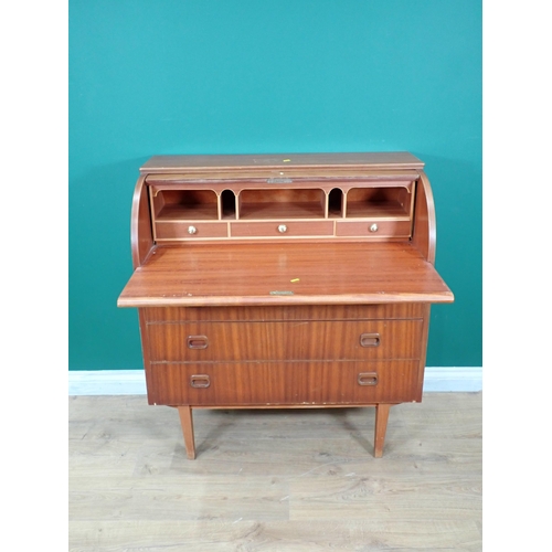 595 - A n oak linenfold panel two door Cupboard and a teak roll top Bureau