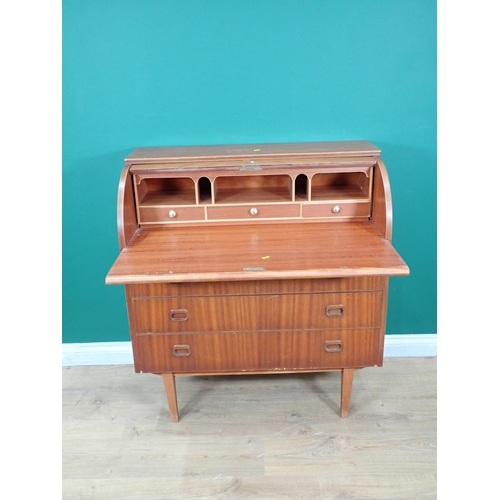 595 - A n oak linenfold panel two door Cupboard and a teak roll top Bureau