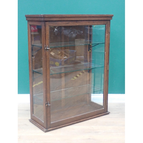 61 - An antique oak and glazed Display Cabinet fitted with glass shelves 3ft 4in H x 2ft 6in W