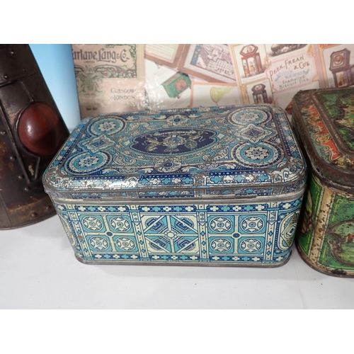 610 - A Huntley & Palmers Lantern Biscuit Tin and three other Tins