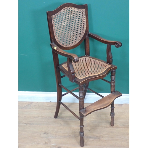 612 - A Victorian mahogany child's High Chair with cane back and seat