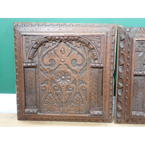 624 - Four 17th Century  oak Panels carved rosettes amongst leafage within arches 18in H x 17in W