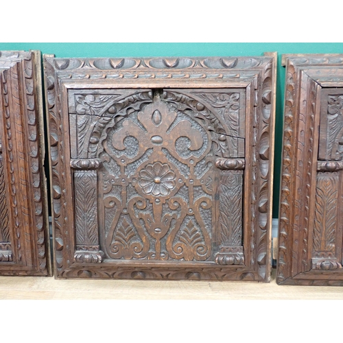 624 - Four 17th Century  oak Panels carved rosettes amongst leafage within arches 18in H x 17in W