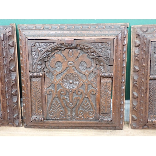 624 - Four 17th Century  oak Panels carved rosettes amongst leafage within arches 18in H x 17in W