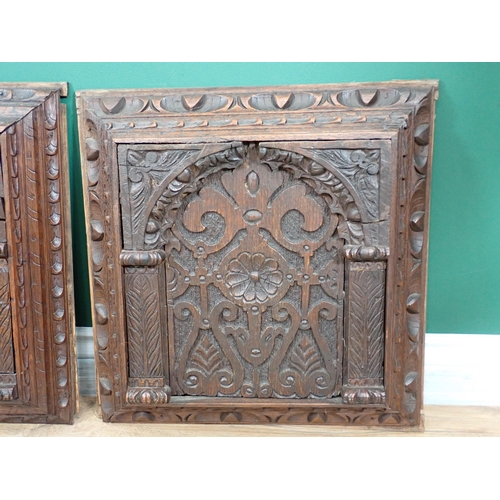 624 - Four 17th Century  oak Panels carved rosettes amongst leafage within arches 18in H x 17in W