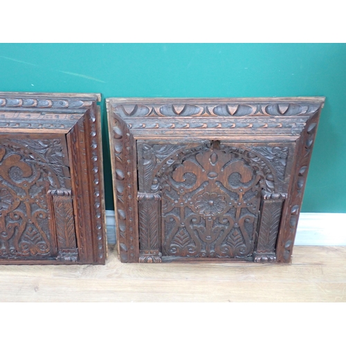 624 - Four 17th Century  oak Panels carved rosettes amongst leafage within arches 18in H x 17in W