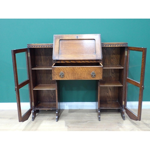 63 - An oak Bureau with fall front flanked by two glazed bookcase sections 3ft 9in W x 3ft 5in H