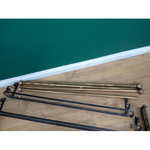 637 - Three Curtain Poles, two wall mounted Plant Shelves and a pierced brass Fender