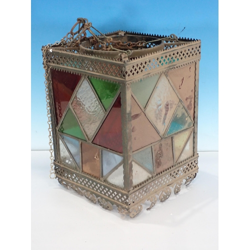 638 - A copper Lantern with coloured leaded glass pains 11in x 8in