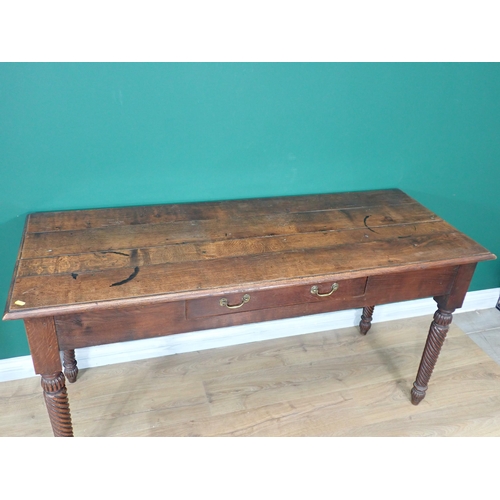 65 - An oak Serving Table fitted single frieze drawer on spiral turned supports 5ft W x 2ft 6in H