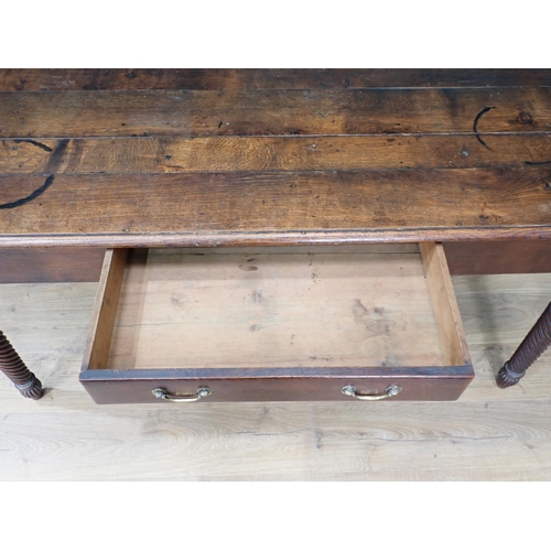 65 - An oak Serving Table fitted single frieze drawer on spiral turned supports 5ft W x 2ft 6in H