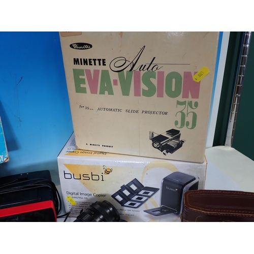 662 - A box of Cameras including Ilford, Praktika, Paxina, a boxed Minette Eva-Vision Slide Projector and ... 