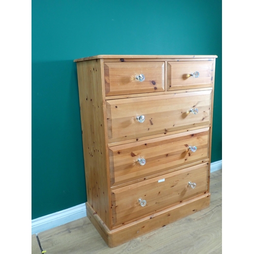 682 - A modern pine Chest of two short and three long drawers 3ft 9in H x 2ft 11in W and a triptych Dressi... 