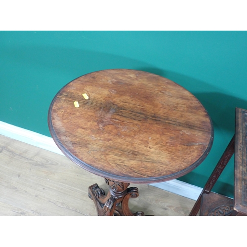 70 - A 19th Century rosewood circular Pillar Table mounted upon leafage carved baluster column and three ... 