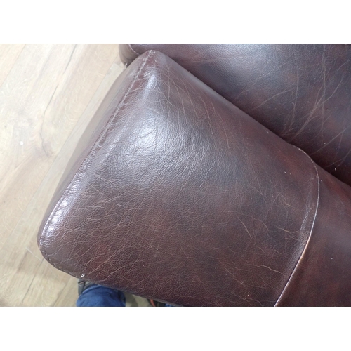 71 - A modern brown leather effect two seater Sofa 5ft W x 2ft 6in H, an electric reclining/massaging Arm... 