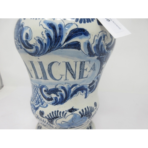 89 - An 18th Century Delft, blue and white Drug Jar titled 'CASSIA LIGNEA', stylised floral scroll surrou... 