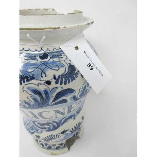 89 - An 18th Century Delft, blue and white Drug Jar titled 'CASSIA LIGNEA', stylised floral scroll surrou... 