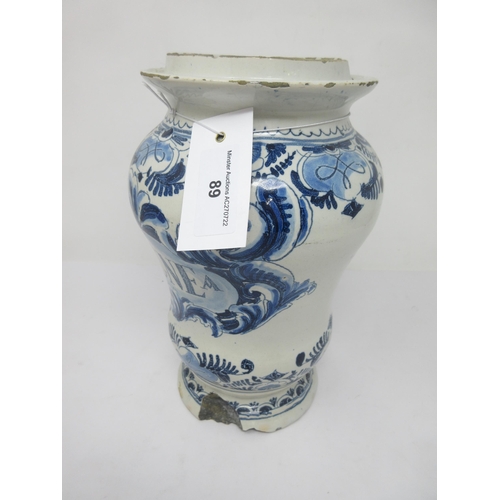 89 - An 18th Century Delft, blue and white Drug Jar titled 'CASSIA LIGNEA', stylised floral scroll surrou... 