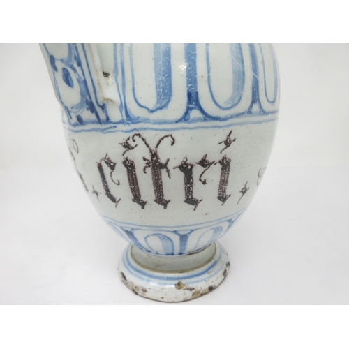 90 - A Delft blue and white Drug Jar with spout, manganese title 'S.S. Citri', 8in, A/F