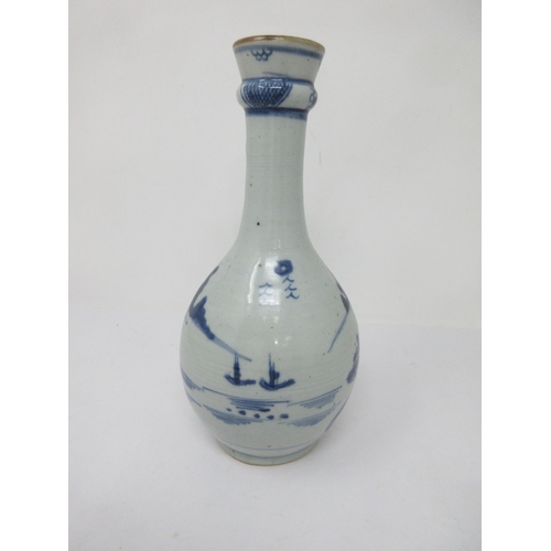 91 - A Chinese blue and white Bottle Vase painted landscape frieze, 9½ in